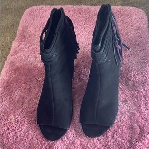 Black Nine West heel boots with purple fray